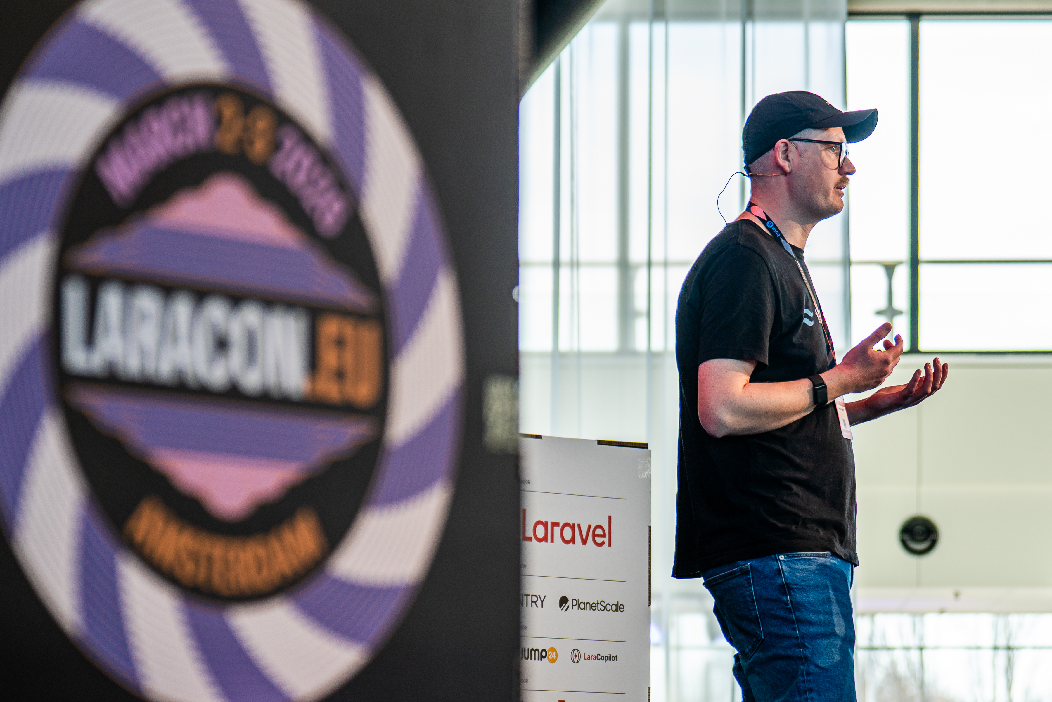 Peter Suhm speaking on stage at Laracon EU 2026